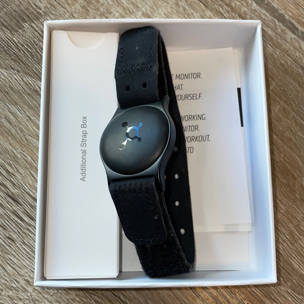 Orange theory heart rate monitor with charger and extra band!